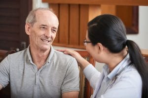News & events Careful doctor with senior man