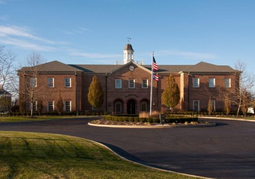 A large brick building with a clock tower.