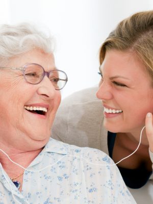 Caregiver Enjoying Music With Senior Caregiver Enjoying Music With Senior